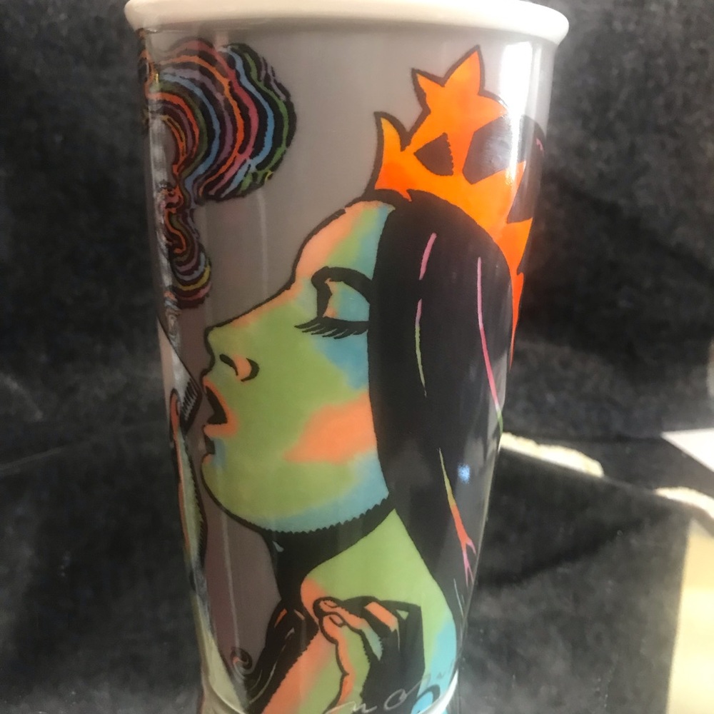 Starbucks/This is a beautiful ceramic cup with a ceramic lid